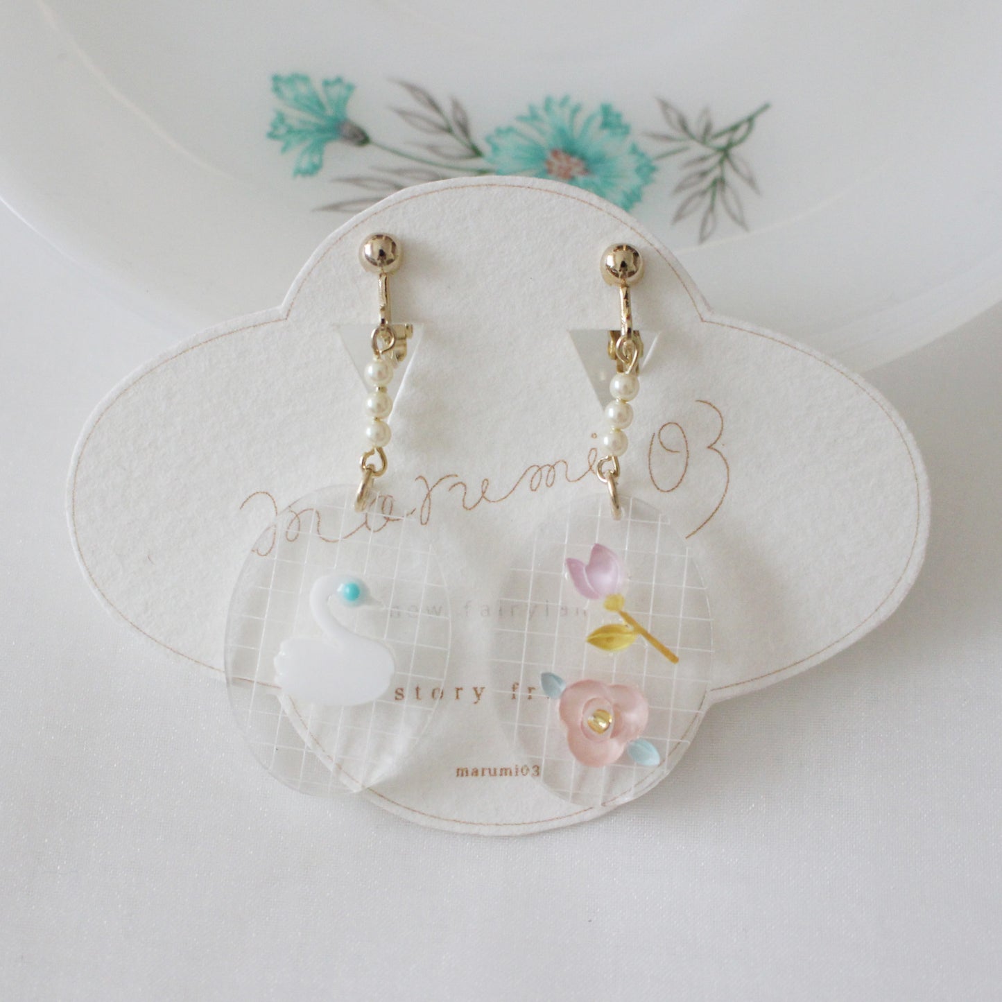 story frame earrings