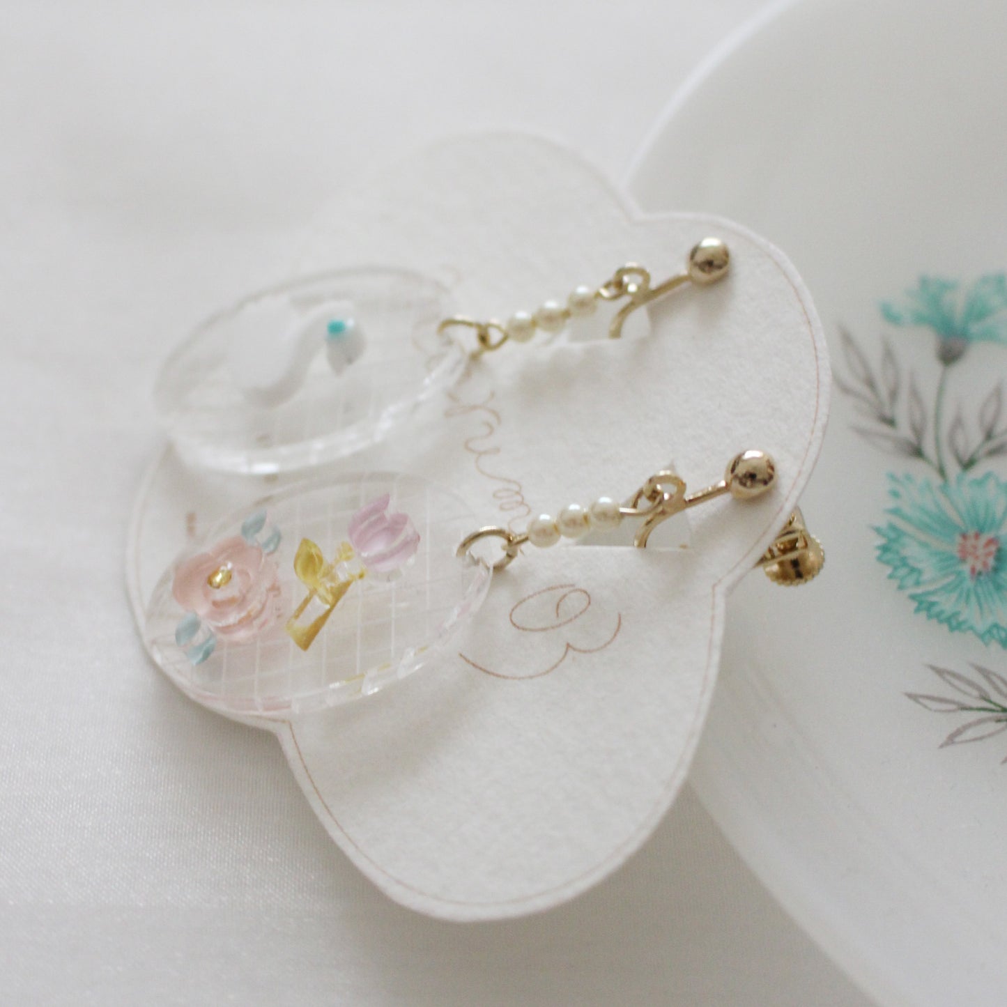 story frame earrings