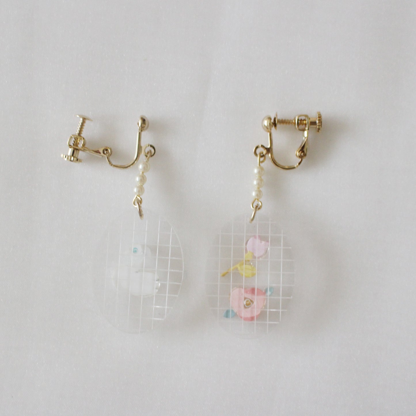 story frame earrings