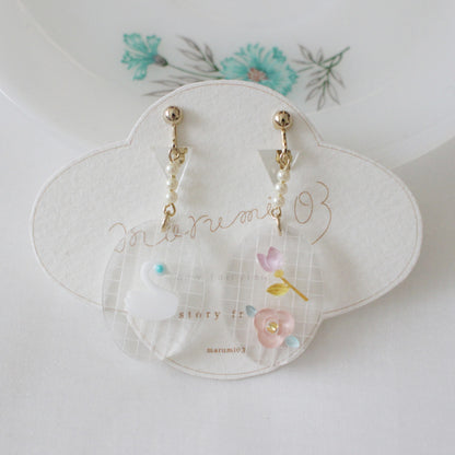 story frame earrings