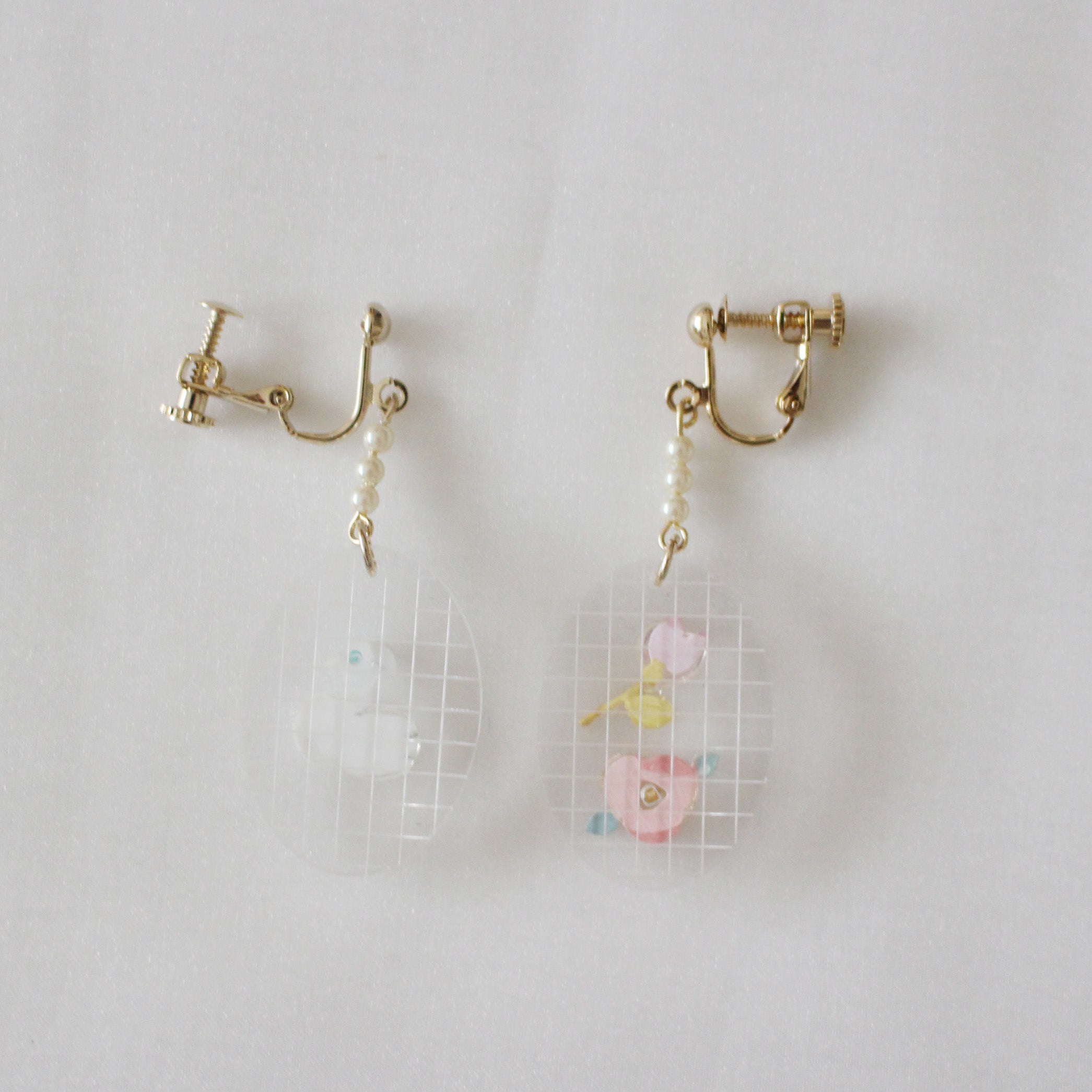 story frame earrings